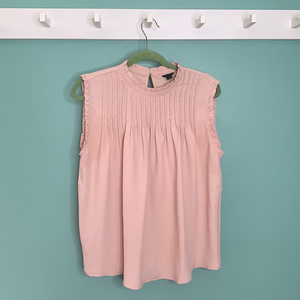 Sleeveless Blouse with ruffle detail